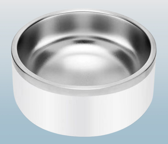 a close-up shot of a stainless steel and a ceramic dog bowl side by side