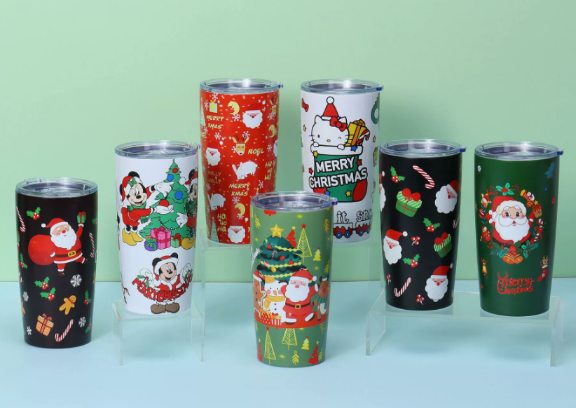 A person holding a sleek, modern custom-branded stainless steel water bottle with a vibrant, full-wrap sublimated design.
