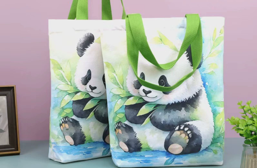 A close-up of a vibrant sublimation print on a heather-colored fabric texture